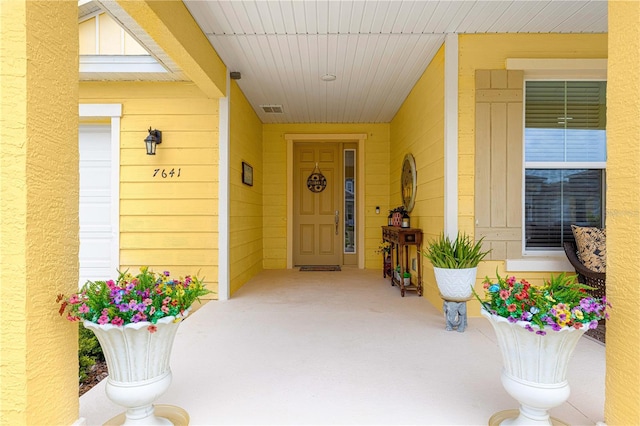7641 SW 63rd Lane Rd, Ocala, FL 34474 - property entrance with covered porch