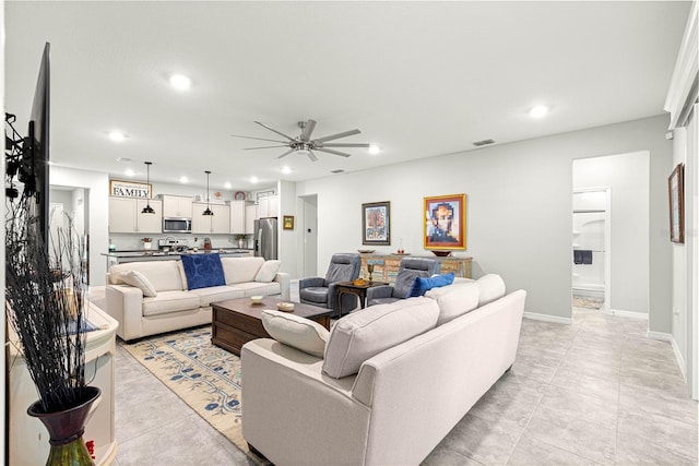 7641 SW 63rd Lane Rd, Ocala, FL 34474 - living area with ceiling fan, recessed lighting, light tile patterned flooring, and baseboards