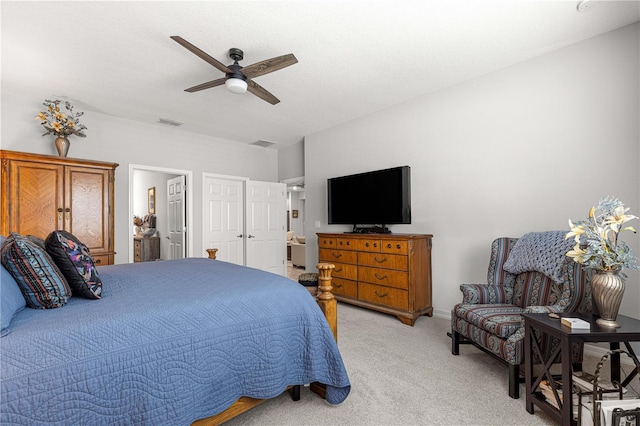 7641 SW 63rd Lane Rd, Ocala, FL 34474 - bedroom featuring light carpet, a ceiling fan, and ensuite bath