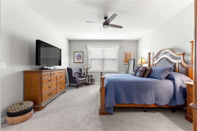 7641 SW 63rd Lane Rd, Ocala, FL 34474 - bedroom featuring light carpet, ceiling fan, and a textured ceiling