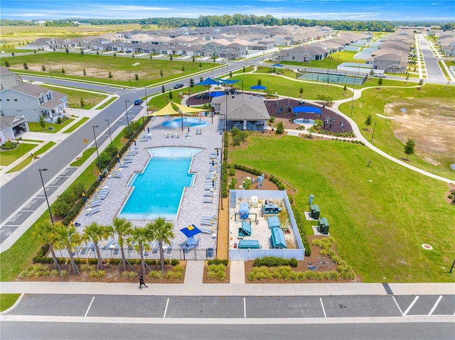 7641 SW 63rd Lane Rd, Ocala, FL 34474 - aerial perspective of suburban area with a pool area