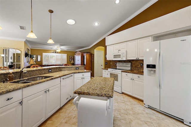 kitchen with white appliances, crown molding, ceiling fan, a sink, and lofted ceiling