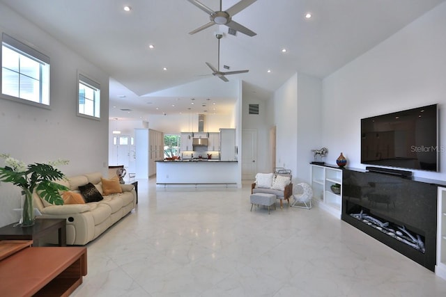 601 SE 80th St, Ocala, FL 34480 - living room with high vaulted ceiling, a ceiling fan, light marble finish flooring, and recessed lighting