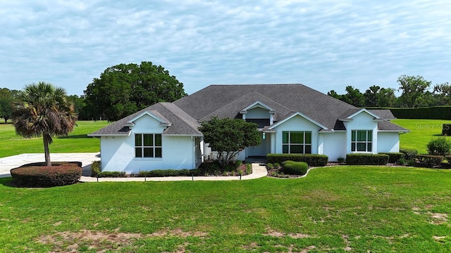 601 SE 80th St, Ocala, FL 34480 - ranch-style home with a front yard and stucco siding