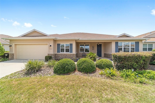 9839 SW 90th St, Ocala, FL 34481 - ranch-style house featuring stucco siding, stone siding, and a garage