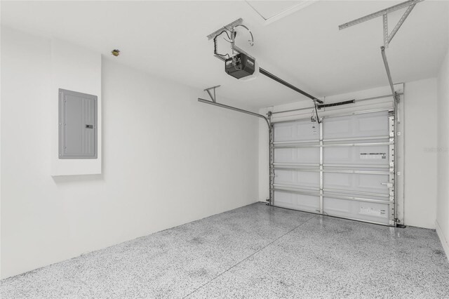 904 NW 67th St, Ocala, FL 34474 - garage with electric panel and a garage door opener
