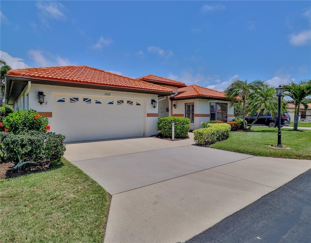 mediterranean / spanish-style home featuring a tiled roof, a garage, driveway, and stucco siding