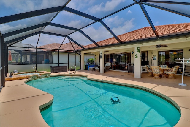 view of swimming pool with ceiling fan, a patio, a pool with connected hot tub, an outdoor living space, and glass enclosure