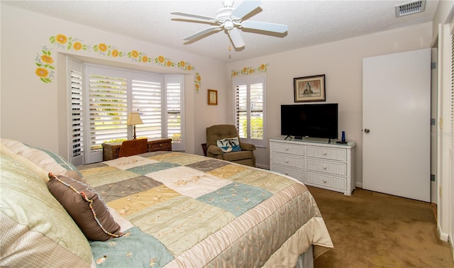 bedroom featuring carpet and a ceiling fan