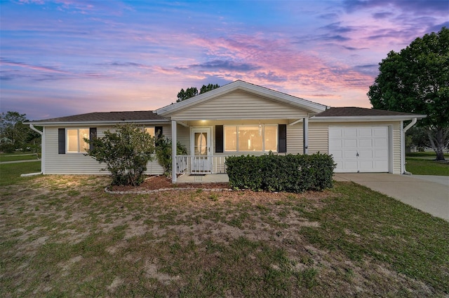 8375 SW 109th Lane Rd, Ocala, FL 34481 - single story home featuring a porch, a garage, concrete driveway, and a front yard