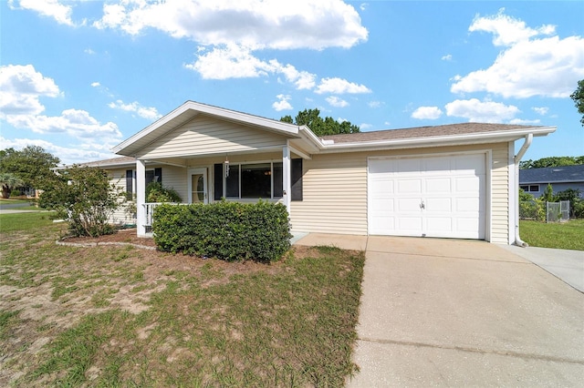 8375 SW 109th Lane Rd, Ocala, FL 34481 - single story home featuring a garage, concrete driveway, and covered porch