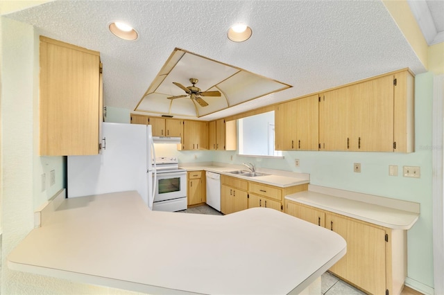 8375 SW 109th Lane Rd, Ocala, FL 34481 - kitchen with white appliances, a sink, a peninsula, a ceiling fan, and under cabinet range hood
