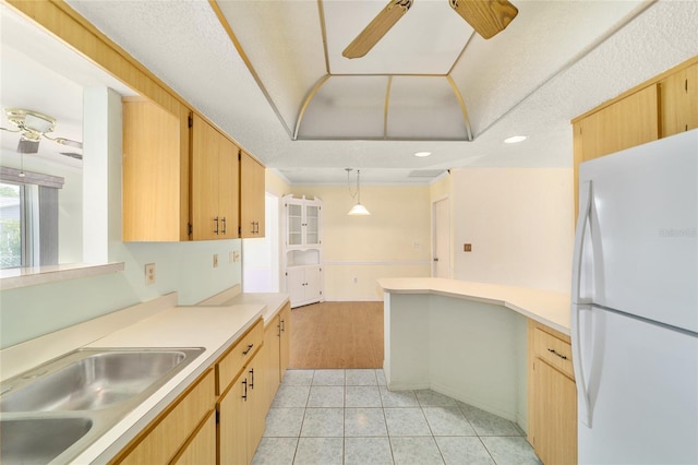 8375 SW 109th Lane Rd, Ocala, FL 34481 - kitchen with freestanding refrigerator, ceiling fan, light tile patterned floors, light countertops, and recessed lighting