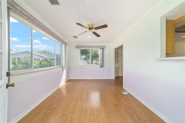 8375 SW 109th Lane Rd, Ocala, FL 34481 - empty room featuring ceiling fan, light wood-style flooring, baseboards, and crown molding