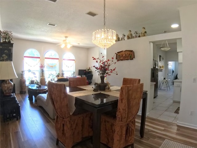 5340 NW 26th Ln, Ocala, FL 34482 - dining space with ceiling fan, light wood finished floors, a chandelier, and recessed lighting
