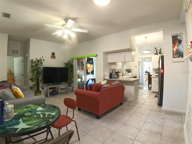 5340 NW 26th Ln, Ocala, FL 34482 - living area with ceiling fan and light tile patterned floors