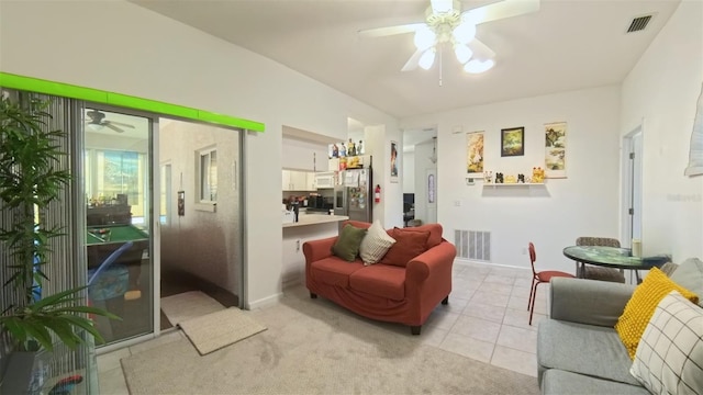 5340 NW 26th Ln, Ocala, FL 34482 - living area with a ceiling fan, light tile patterned floors, and baseboards