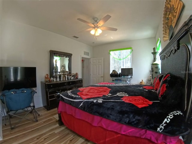 5340 NW 26th Ln, Ocala, FL 34482 - bedroom with light wood-style floors and a ceiling fan