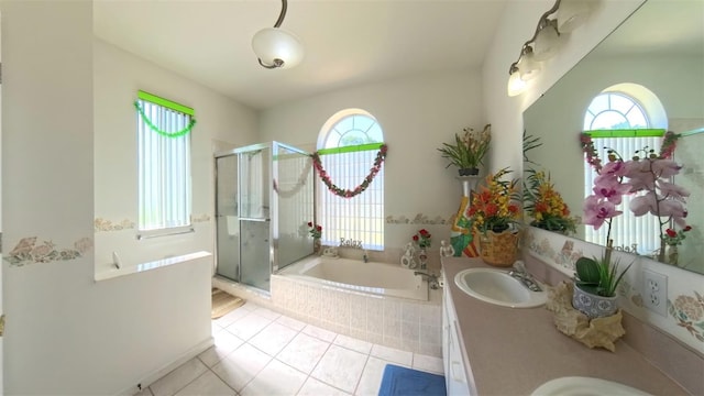 5340 NW 26th Ln, Ocala, FL 34482 - bathroom featuring healthy amount of natural light, a stall shower, and double vanity