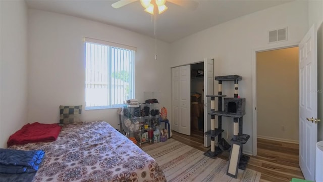 5340 NW 26th Ln, Ocala, FL 34482 - bedroom featuring wood finished floors, a closet, and a ceiling fan