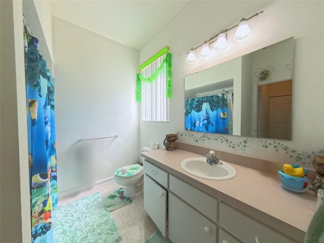 5340 NW 26th Ln, Ocala, FL 34482 - bathroom with vanity, a shower with curtain, toilet, and tile patterned flooring