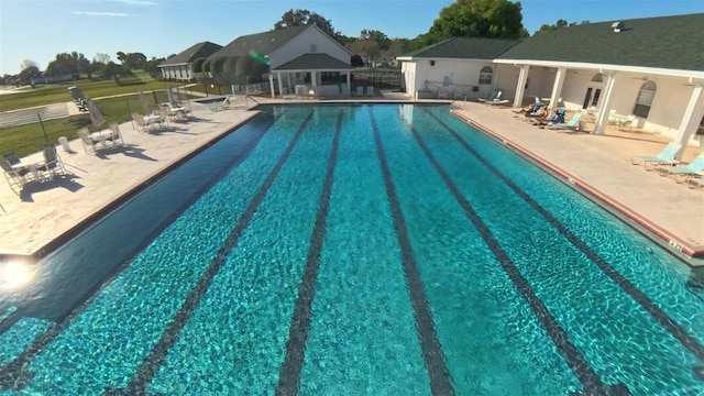 5340 NW 26th Ln, Ocala, FL 34482 - community pool featuring a patio area and fence