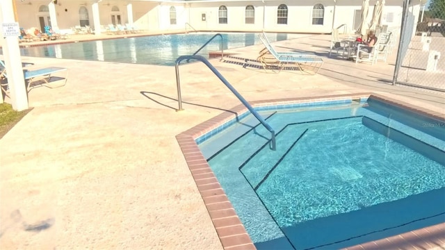 5340 NW 26th Ln, Ocala, FL 34482 - community pool with a patio area