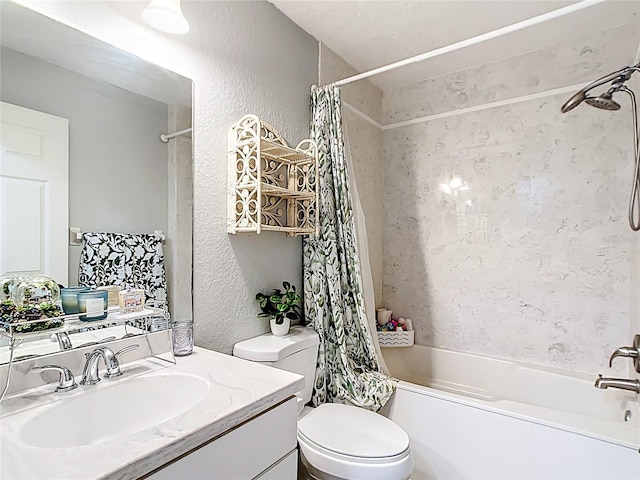 bathroom with a textured wall, shower / bath combo with shower curtain, toilet, and vanity