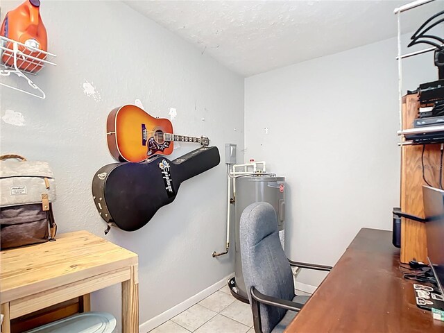 office featuring tile patterned floors and baseboards