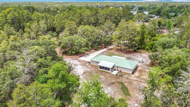 view from above of property featuring a forest