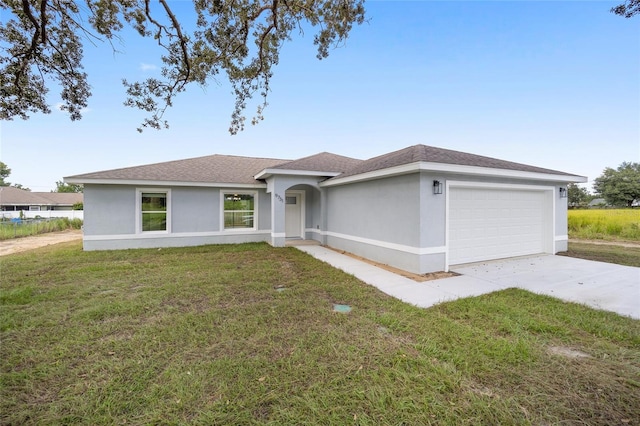 9731 Bahia Rd, Ocala, FL 34472 - ranch-style house with an attached garage, stucco siding, concrete driveway, a front lawn, and roof with shingles