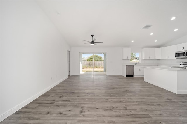 9731 Bahia Rd, Ocala, FL 34472 - kitchen featuring appliances with stainless steel finishes, lofted ceiling, a ceiling fan, light countertops, and recessed lighting