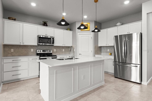 9459 SW 52nd Loop, Ocala, FL 34481 - kitchen with stainless steel appliances, tasteful backsplash, light countertops, recessed lighting, and white cabinetry