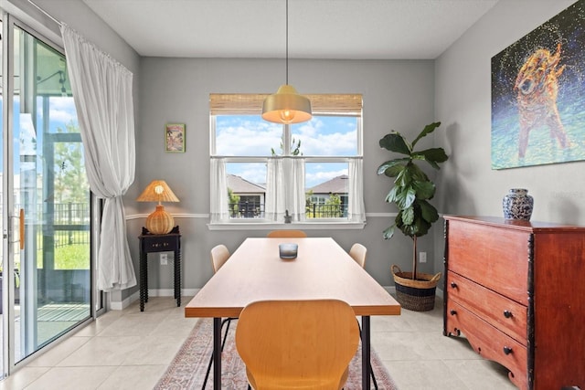 9459 SW 52nd Loop, Ocala, FL 34481 - dining space featuring light tile patterned floors and baseboards