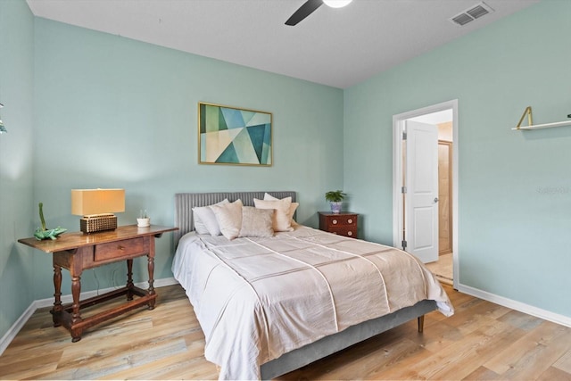 9459 SW 52nd Loop, Ocala, FL 34481 - bedroom featuring wood finished floors and a ceiling fan