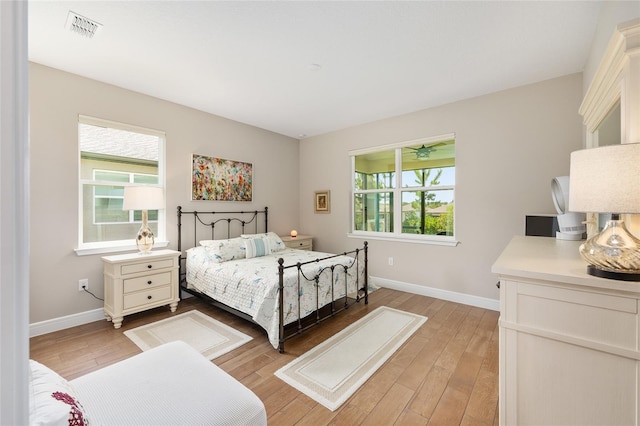 8820 SW 58th Street Rd, Ocala, FL 34481 - bedroom with baseboards and light wood-type flooring
