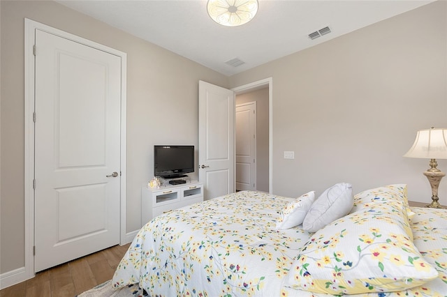 8820 SW 58th Street Rd, Ocala, FL 34481 - bedroom featuring wood finished floors and baseboards