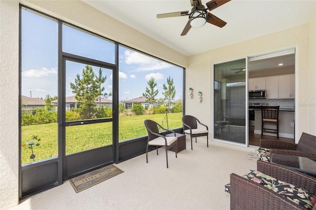8820 SW 58th Street Rd, Ocala, FL 34481 - sunroom featuring a ceiling fan