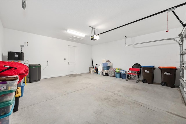 8820 SW 58th Street Rd, Ocala, FL 34481 - garage featuring a garage door opener