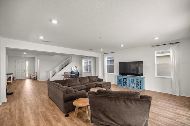 7199 SW 60th Ln, Ocala, FL 34474 - living room featuring stairway, light wood-style floors, recessed lighting, and baseboards