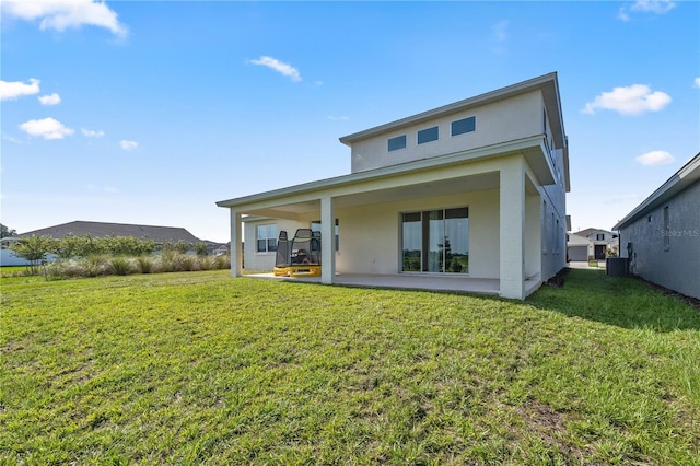 7199 SW 60th Ln, Ocala, FL 34474 - rear view of house with stucco siding, cooling unit, a patio area, and a lawn