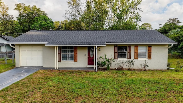 2140 NE 40th St, Ocala, FL 34479 - ranch-style home with stucco siding, concrete driveway, an attached garage, and roof with shingles