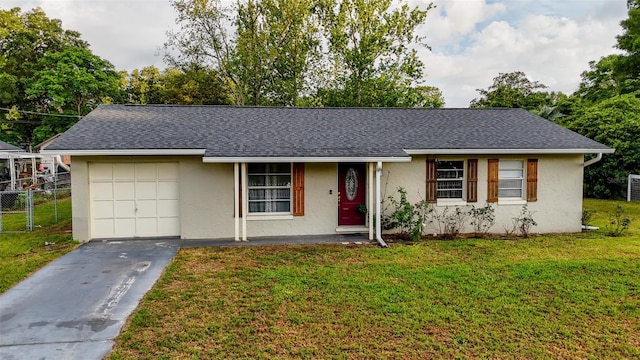 2140 NE 40th St, Ocala, FL 34479 - ranch-style house with stucco siding, driveway, an attached garage, and roof with shingles