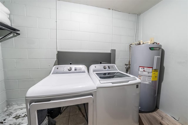 2140 NE 40th St, Ocala, FL 34479 - washroom with water heater and separate washer and dryer