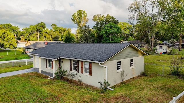 2140 NE 40th St, Ocala, FL 34479 - view of front of property featuring roof with shingles, driveway, a garage, and stucco siding