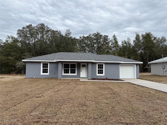 5323 NW 8th Pl, Ocala, FL 34482 - ranch-style home featuring driveway, a garage, stucco siding, view of scattered trees, and a porch