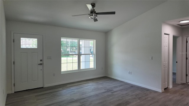 5323 NW 8th Pl, Ocala, FL 34482 - entryway featuring plenty of natural light, wood finished floors, a ceiling fan, and baseboards
