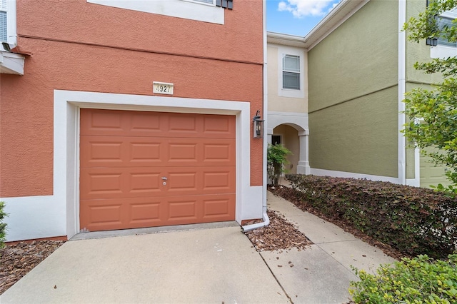 4927 SW 45th Cir, Ocala, FL 34474 - garage featuring concrete driveway
