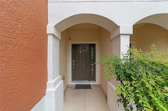 4927 SW 45th Cir, Ocala, FL 34474 - doorway to property with stucco siding