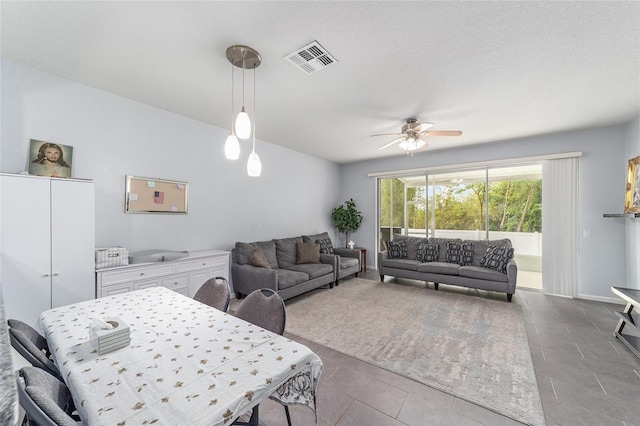 4927 SW 45th Cir, Ocala, FL 34474 - living room with ceiling fan and tile patterned flooring